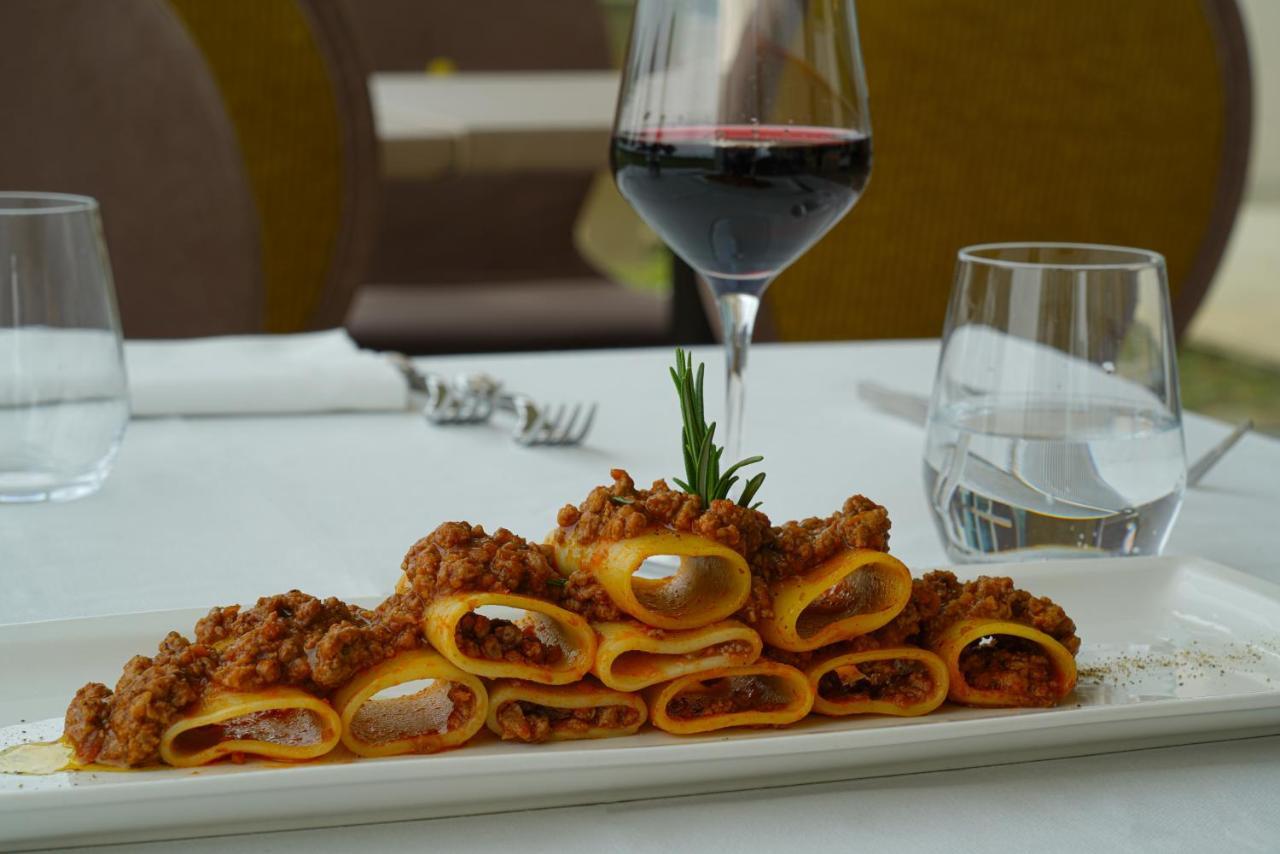 מלון Pisa Tower Plaza מראה חיצוני תמונה A plate of paccheri