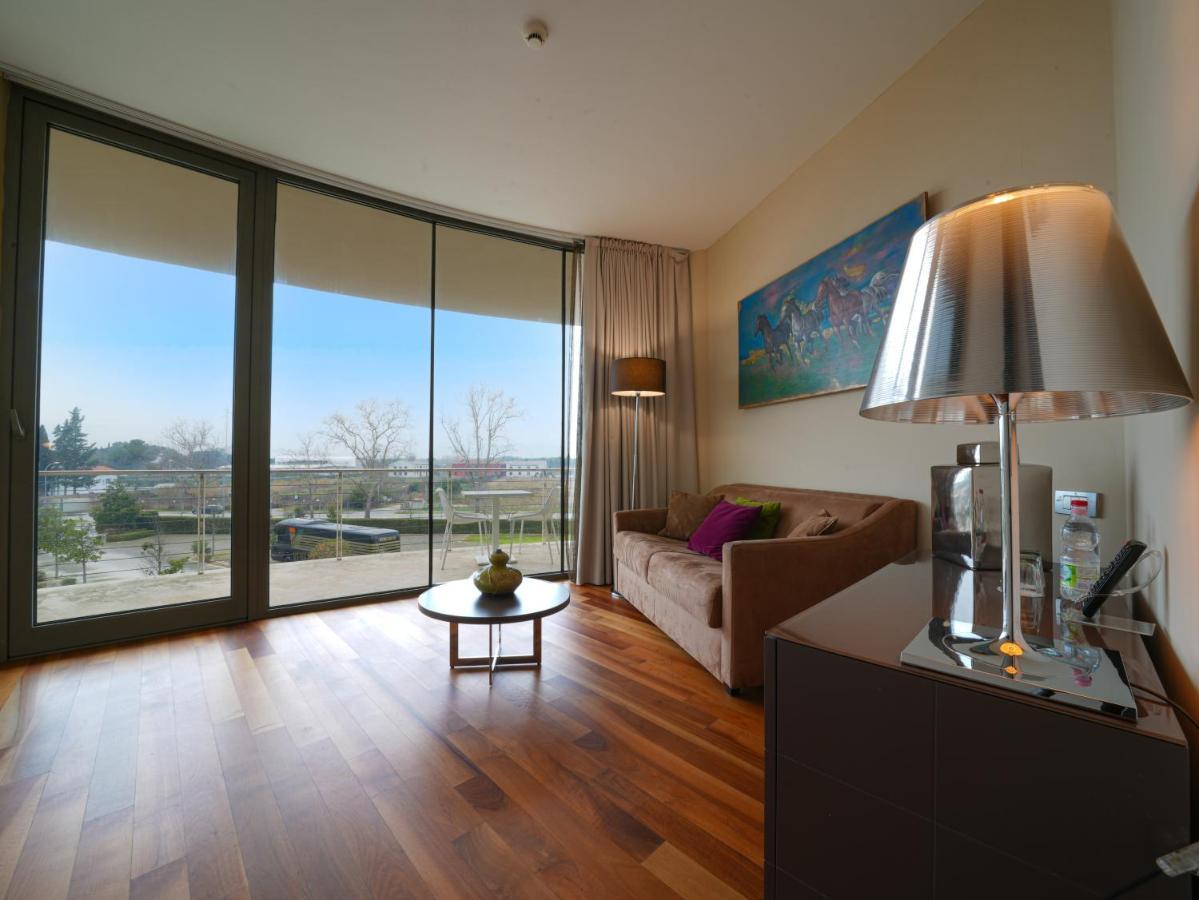 מלון Pisa Tower Plaza מראה חיצוני תמונה A living room in a typical apartment